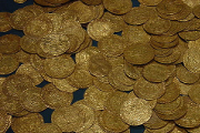 This hoard of ancient gold coins was probably buried by a British nobleman during a time of war. He would have intended to return and retrieve his wealth when hostilities were over. - Copyright: Saperaud